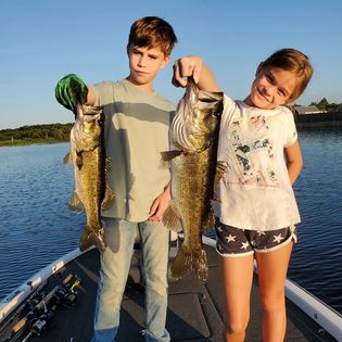 Two anglers fishing in Florida with big fish