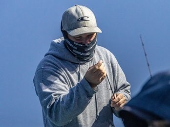 A person fishing in California