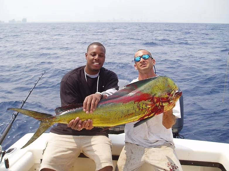 two people fishing in FL with a 41-inch fish