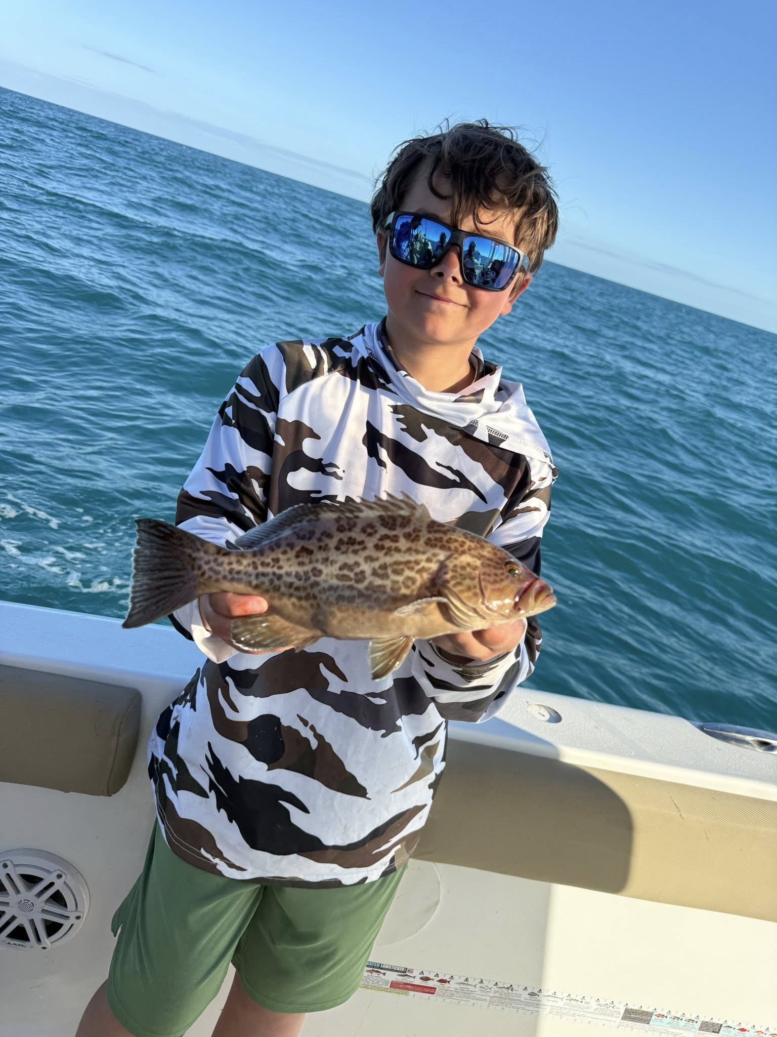 Scamp grouper catch displayed on fishing boat in Port Orange Florida waters