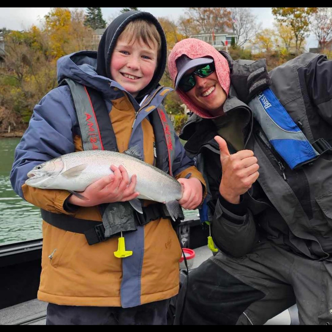 An image of two people fishing at 200 Broadway Avenue