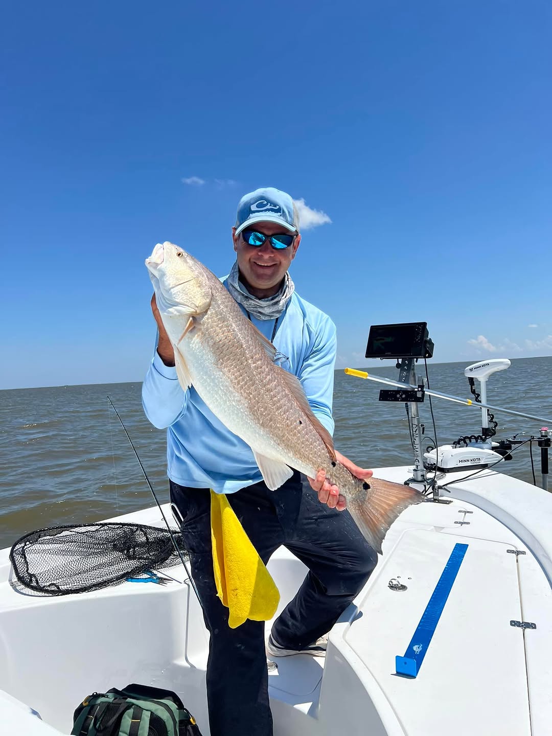 Angler with a 24-inch fish in Slidell