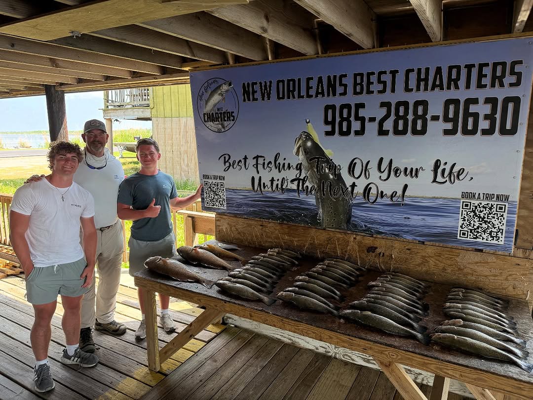 Three people enjoying a fishing trip in Slidell