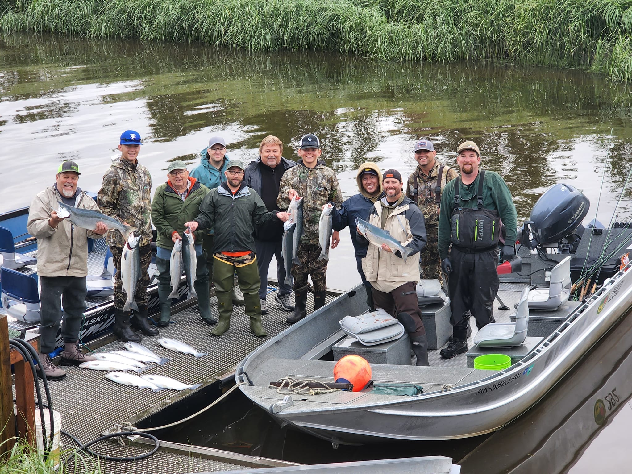 A group of 11 people fishing on the Kenai River