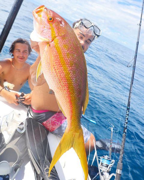 Couple fishing in Naples, Italy