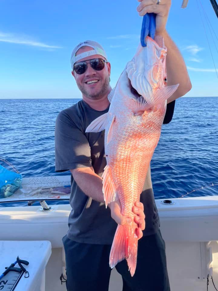 Angler with big 30-inch fish in FL