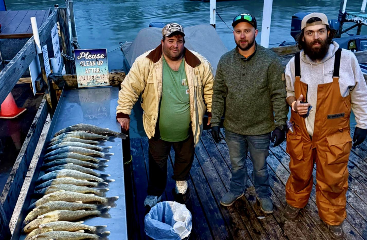 Detroit River Lake St Clair walleye fishing guided trip boat with anglers spring migration