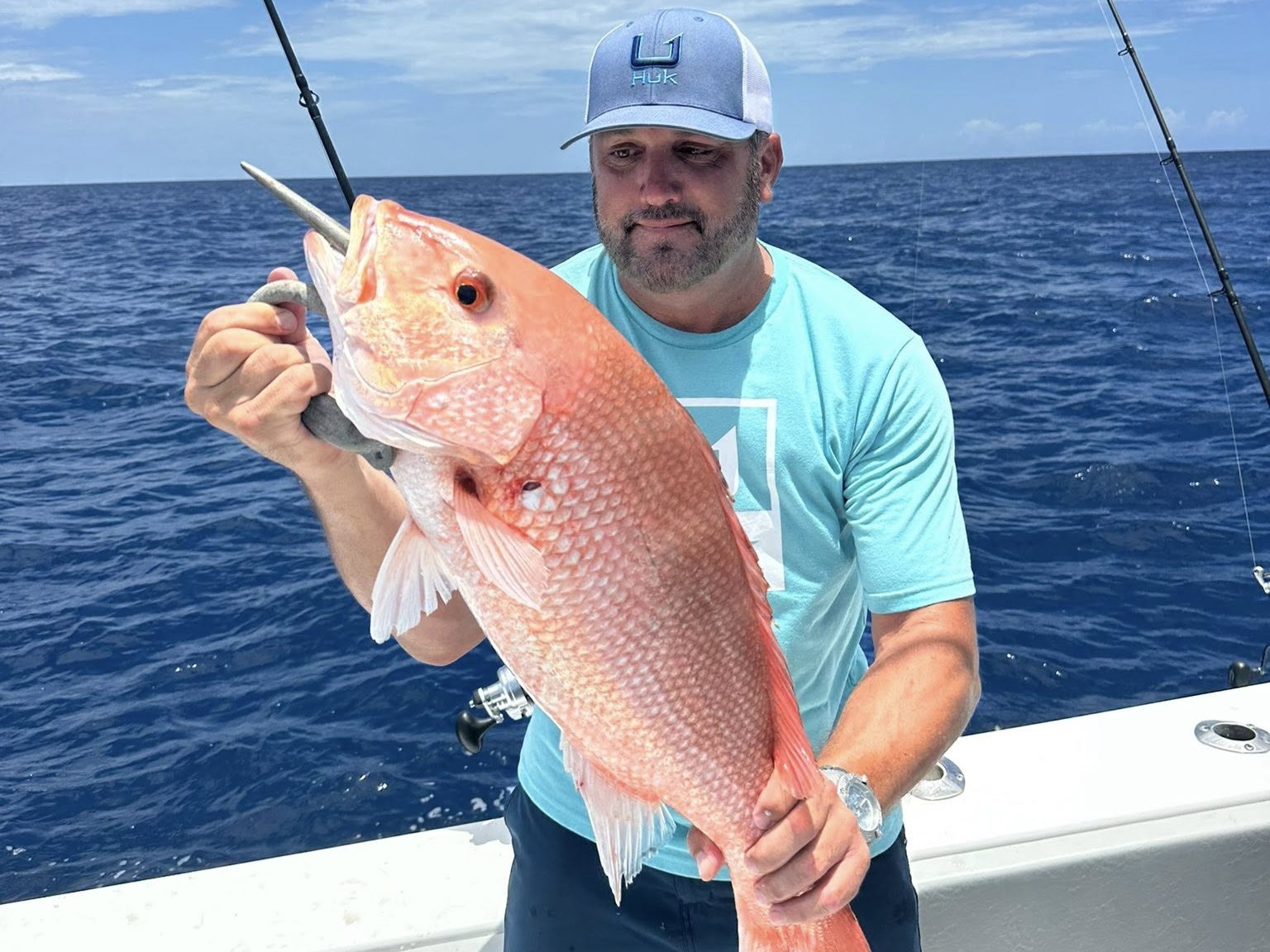 Tampa red snapper fishing charter boat in Gulf of Mexico federal waters with anglers