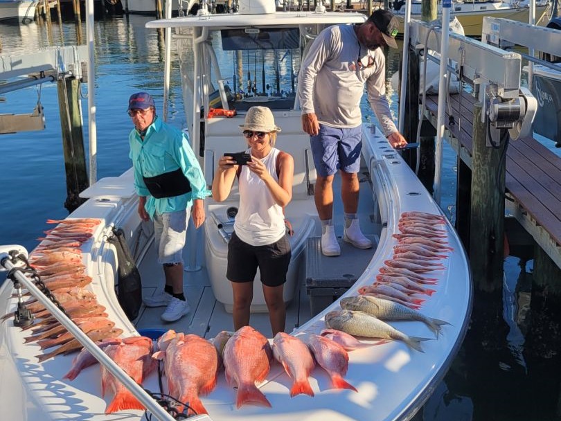Night offshore fishing boat in Gulf of Mexico waters near Tampa targeting grouper and tuna