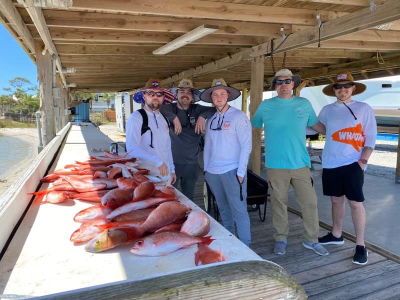 5 people fishing at Orange Beach