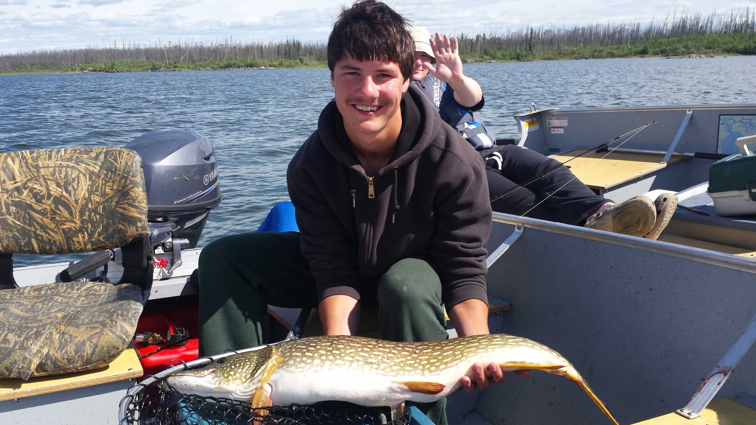 Two people fishing at the North Saskatchewan River