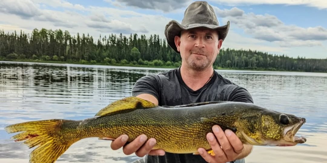 Walleye fishing boat on Mirond Lake Saskatchewan summer package cabin retreat