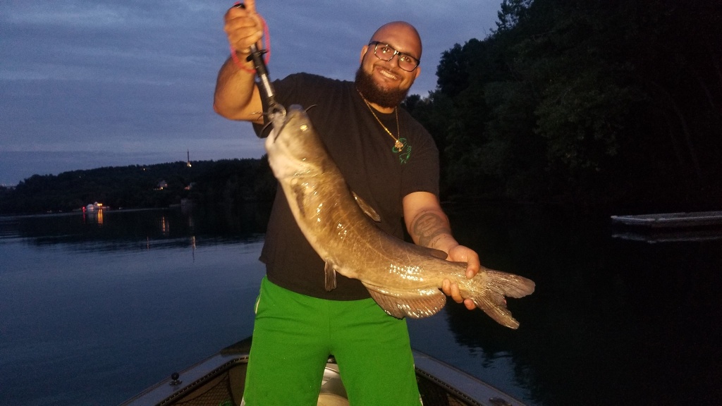 An angler with a 22-inch catch in Ransomville