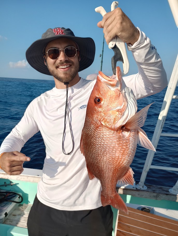 Angler with a large fish in Destin
