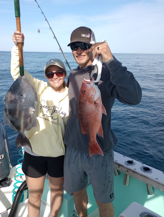 Two grey triggerfish caught fishing in FL