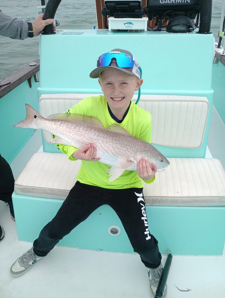 Inshore fishing charter boat in Destin Florida waters targeting redfish and speckled trout