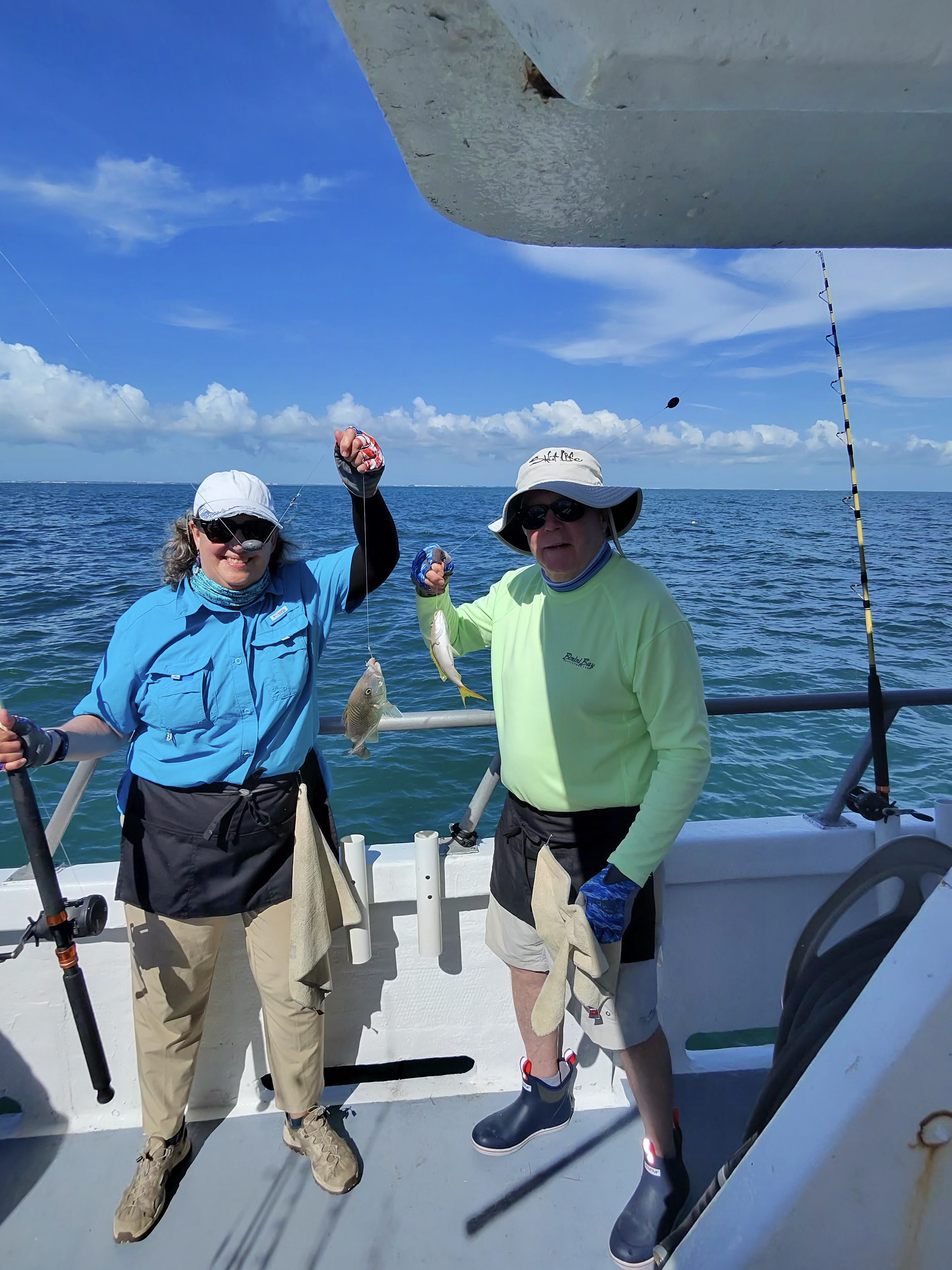 Two people fishing in Florida on a cruises, fishing, and tours adventure