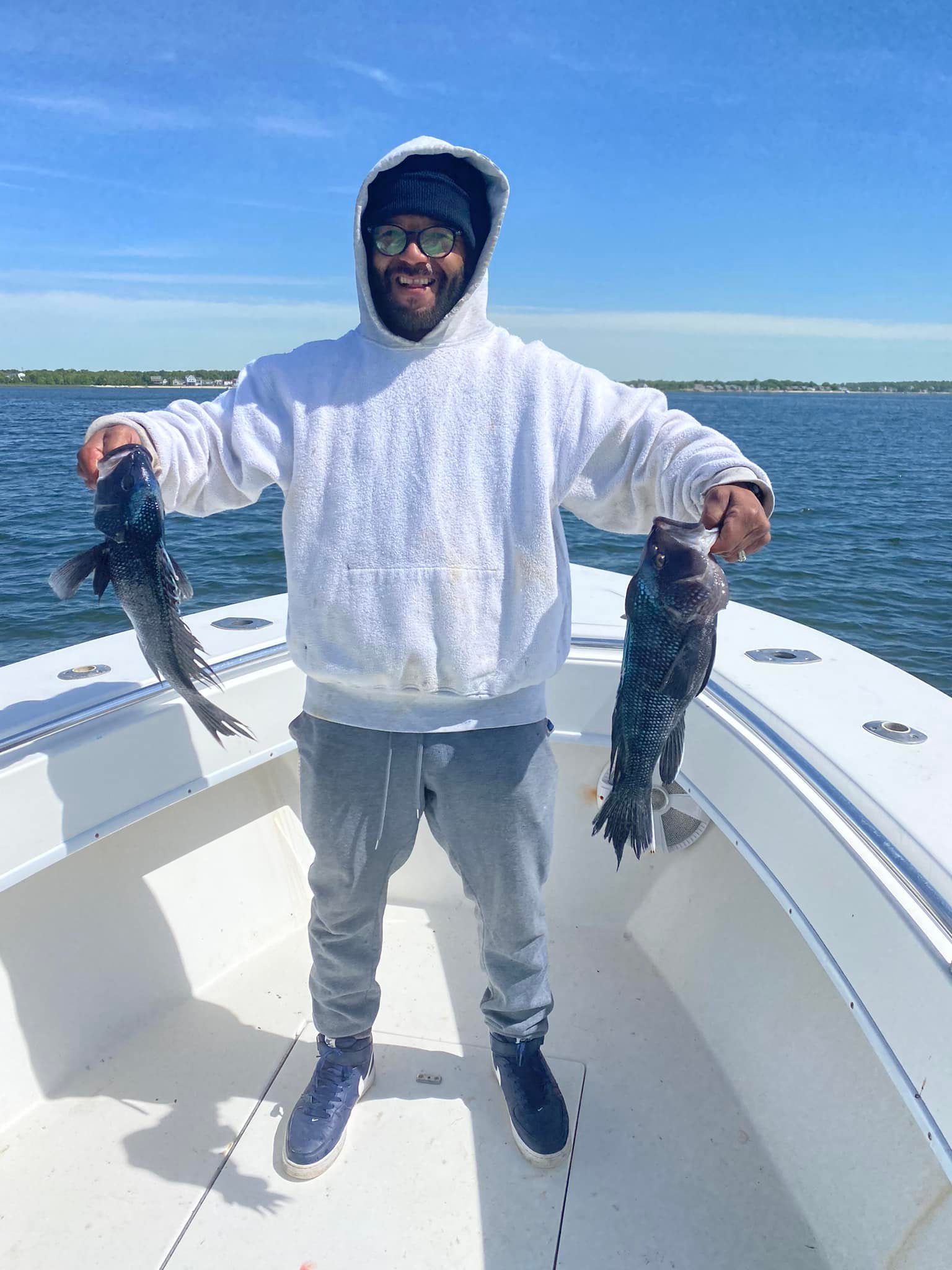 Two big fish caught on a fishing cruises, tours trip in MA