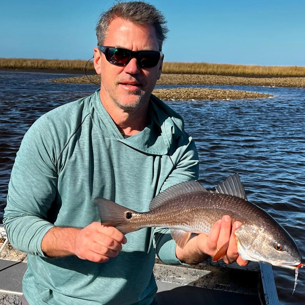 Photograph of a 15-inch redfish caught in Dubois