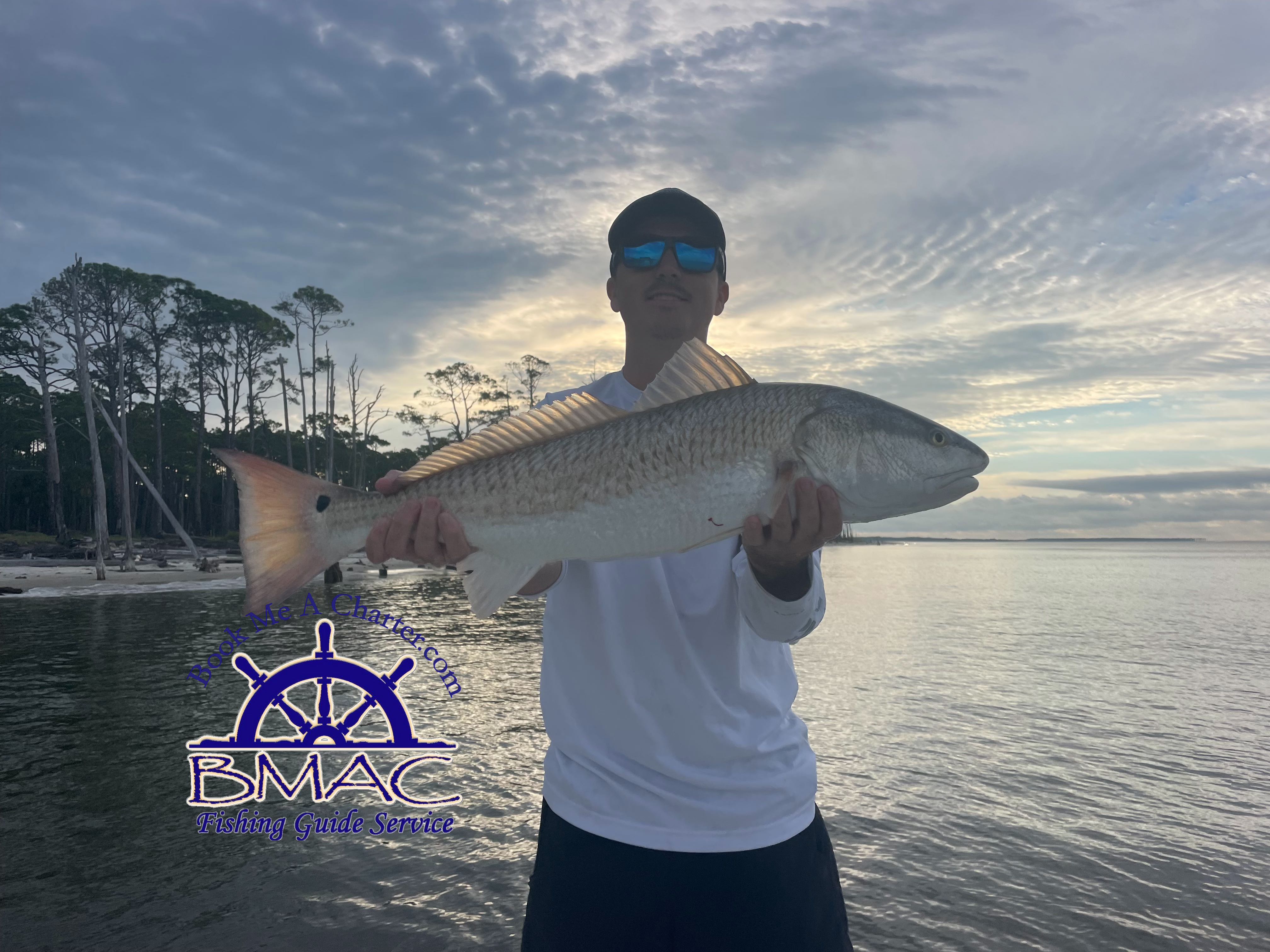 Angler with redfish caught in FL