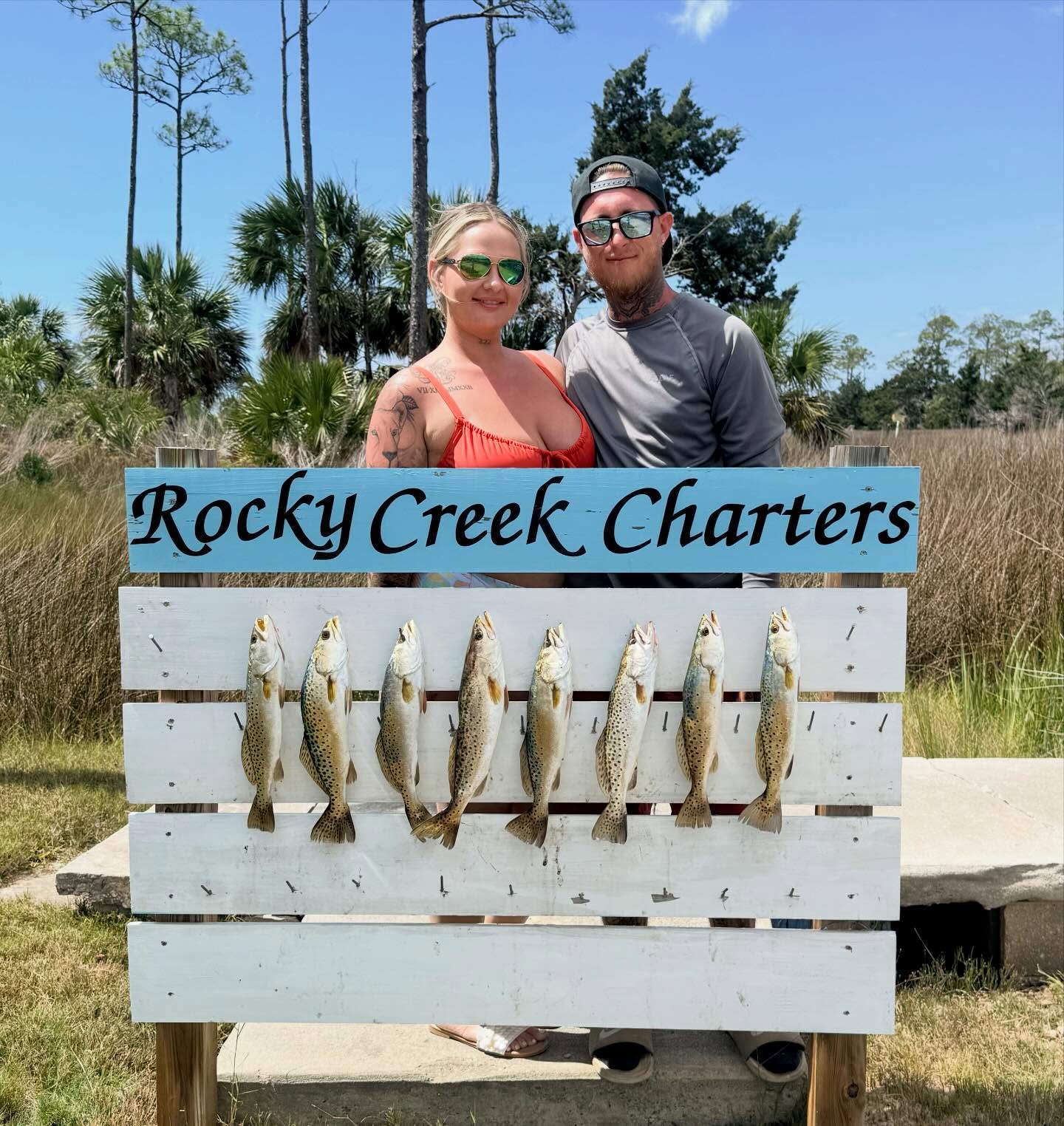 Eight speckled trout displayed on fishing charter cleaning station in Steinhatchee FL