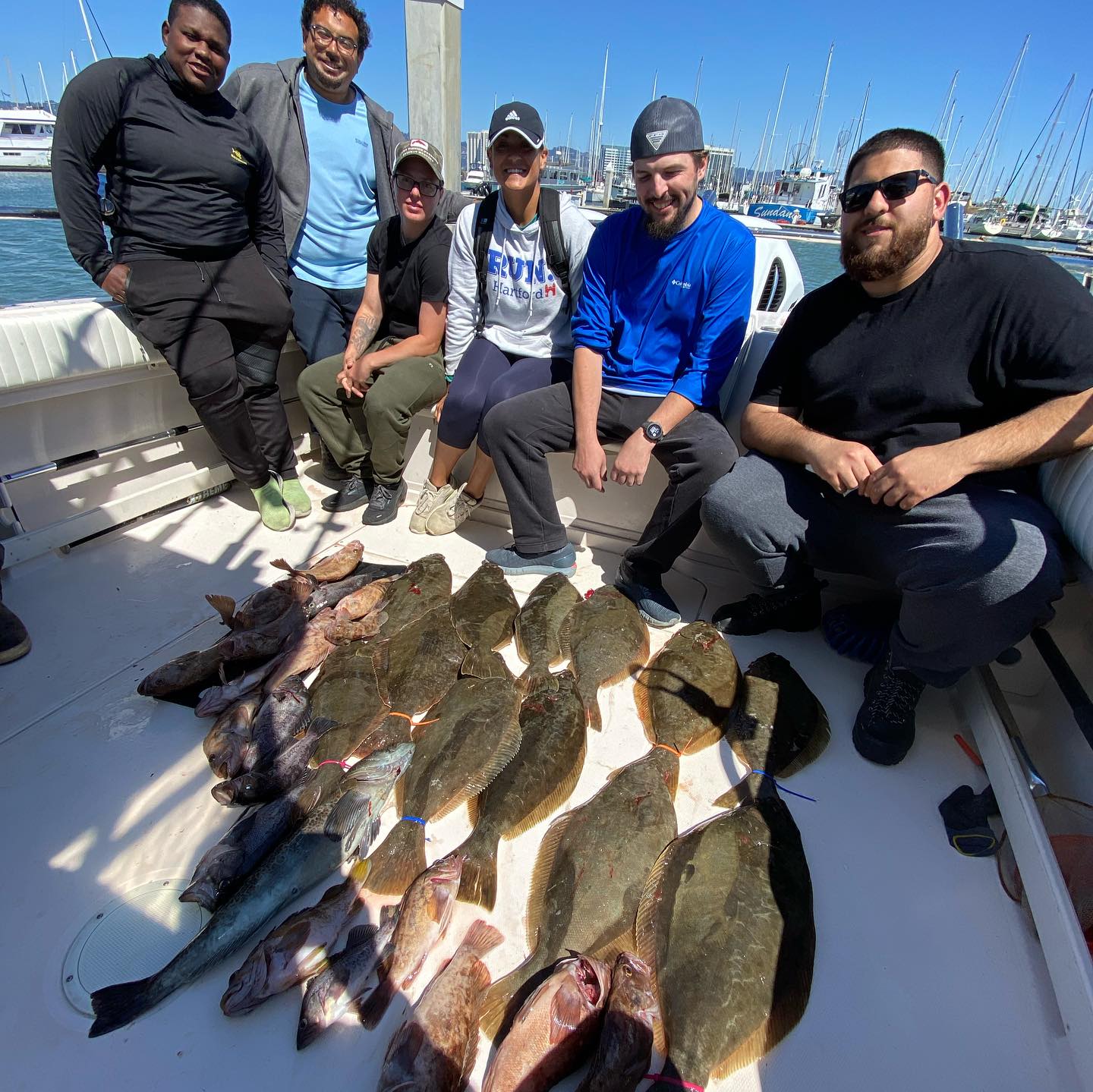 Group of 6 people fishing in California