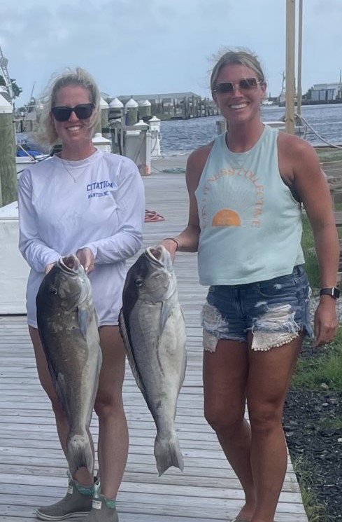 Two anglers with a big catch of fish in Wanchese