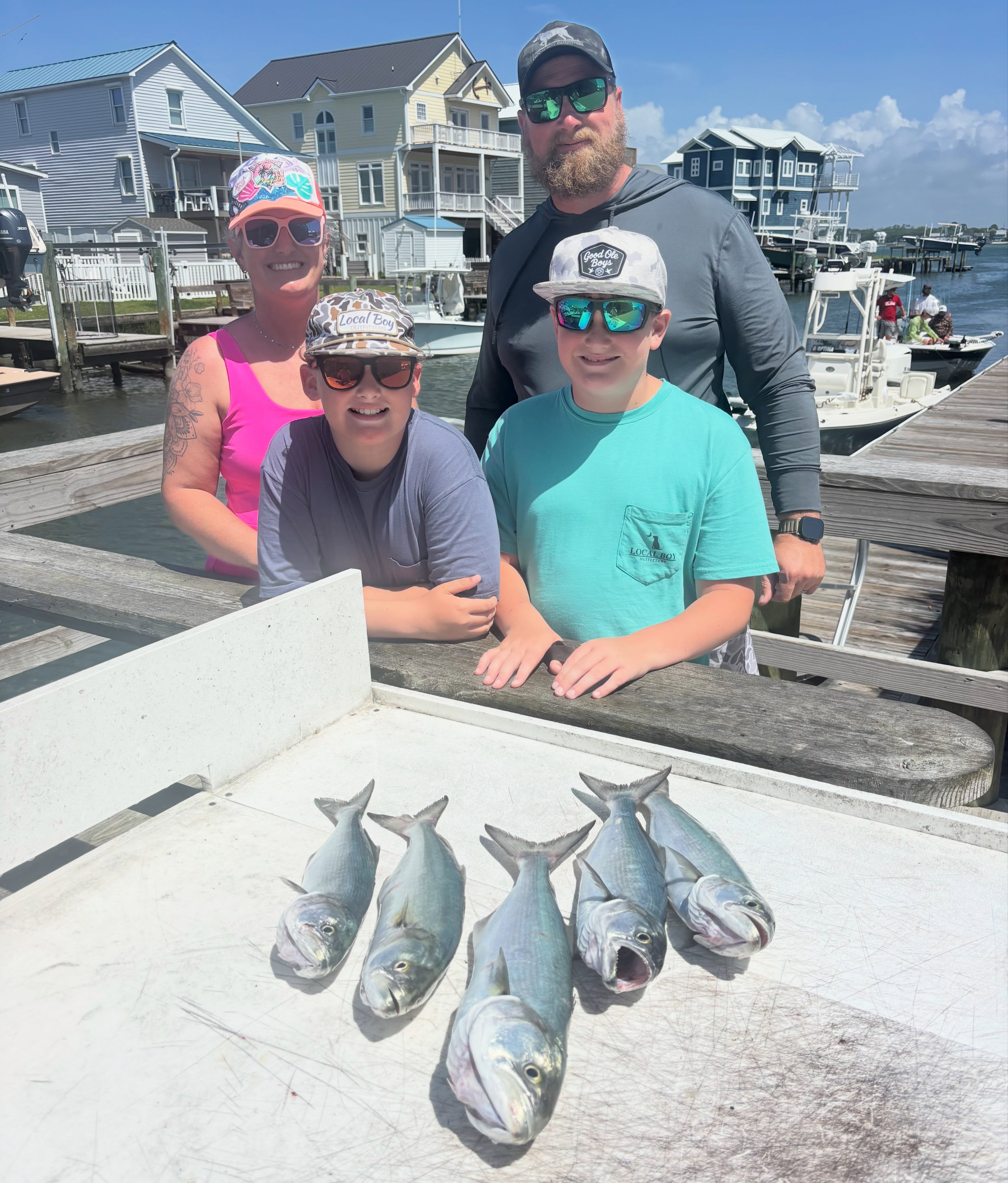 Fresh caught bluefish displayed on cleaning table at Atlantic Beach NC fishing dock