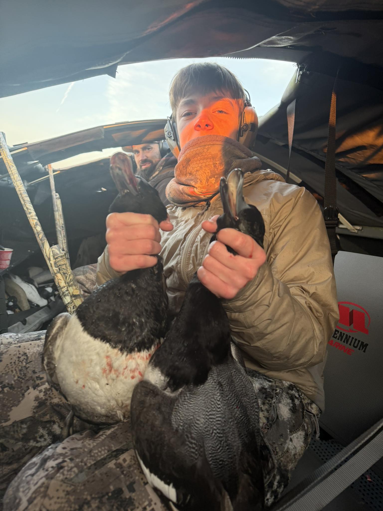 Waterfowl hunting success in Port Clinton Ohio with harvested birds in boat