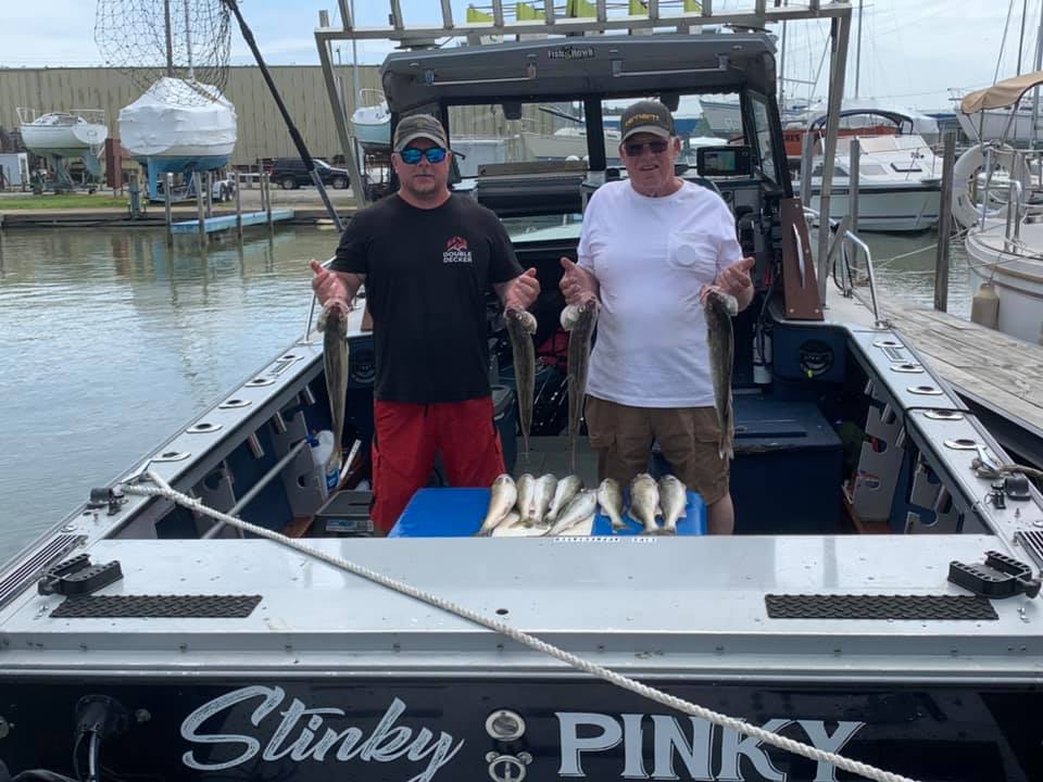 Two people fishing in Port Clinton