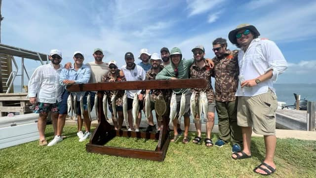 Group of 12 people fishing in TX