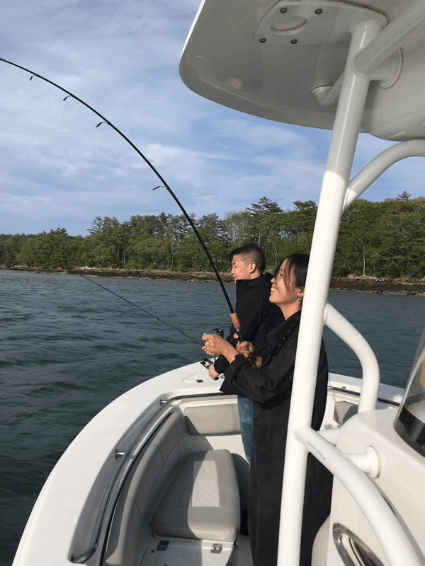 Two people fishing in Maine