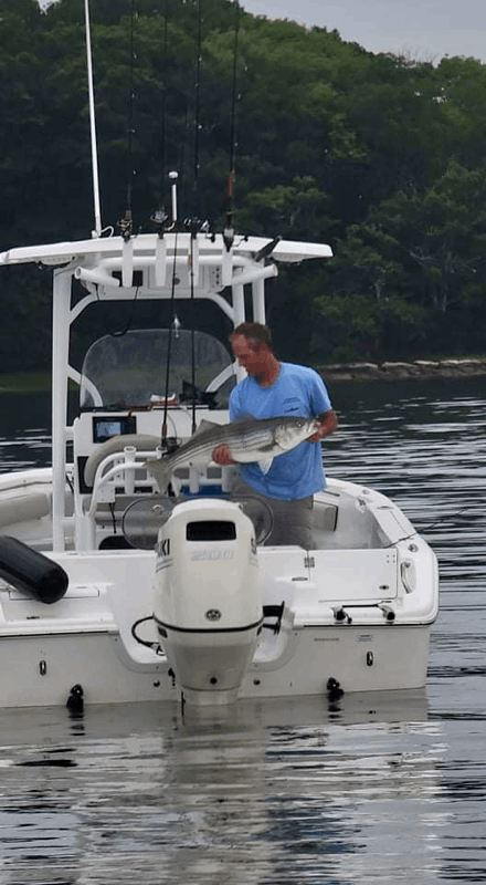 Fishing in Maine with a 26-inch fish