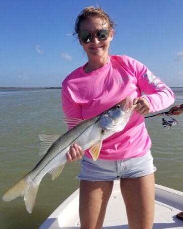 Fishing in Islamorada with a 18-inch catch