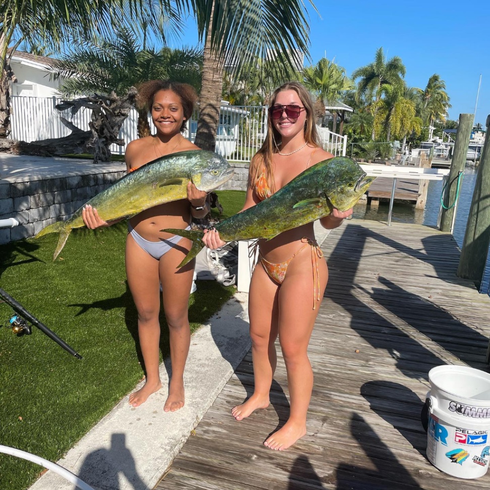 Two anglers fishing in Florida with big fish