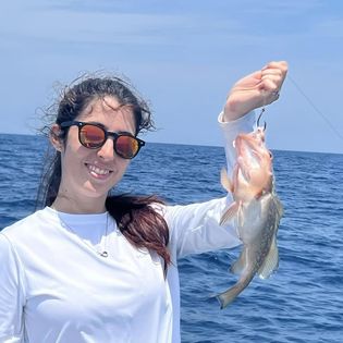 A lone angler fishes in the waters of FL.