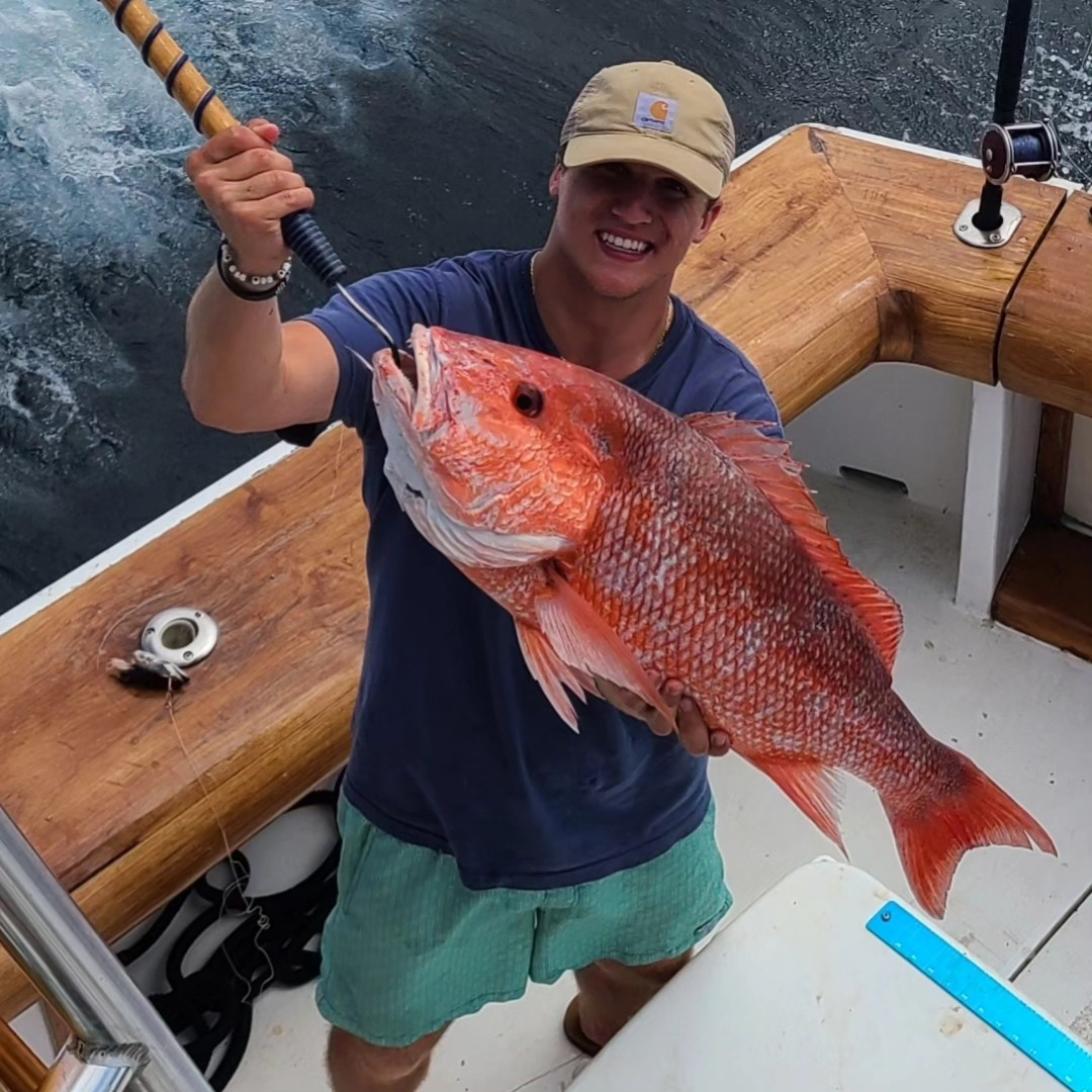 Angler with a 20-inch fish in Destin