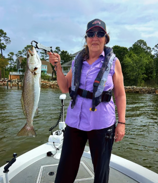 Speckled trout catch held up on fishing boat in Milton FL waters