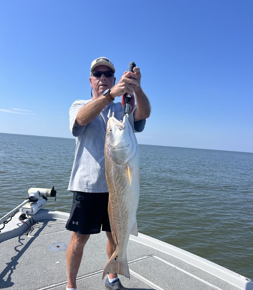 Large redfish caught while fishing in Venice Louisiana waters