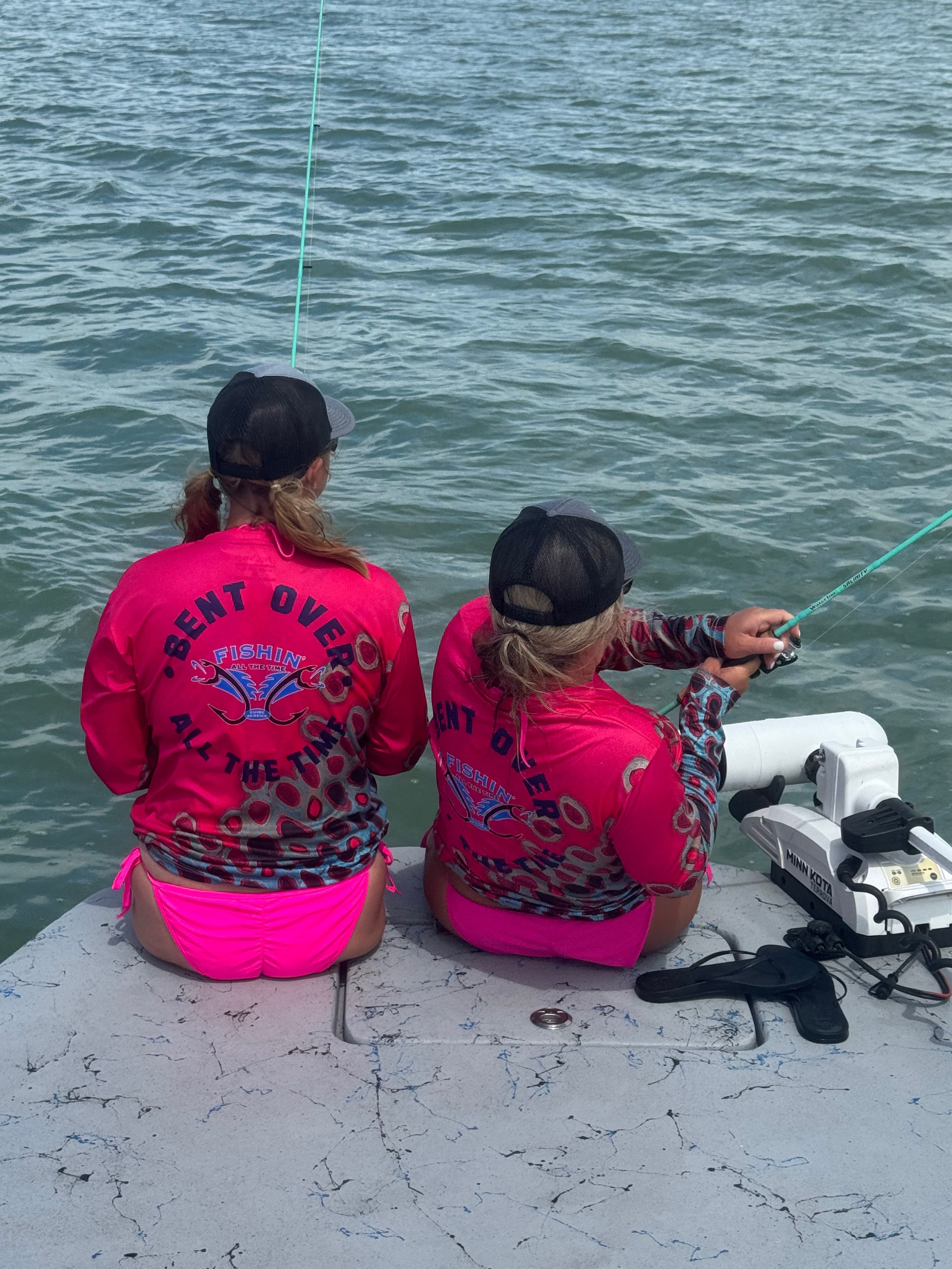 Two anglers fishing from boat dock in Pleasanton TX waters