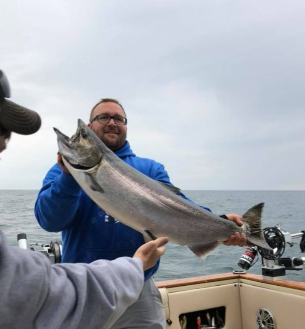 A lone angler enjoying a fishing trip in North Muskegon