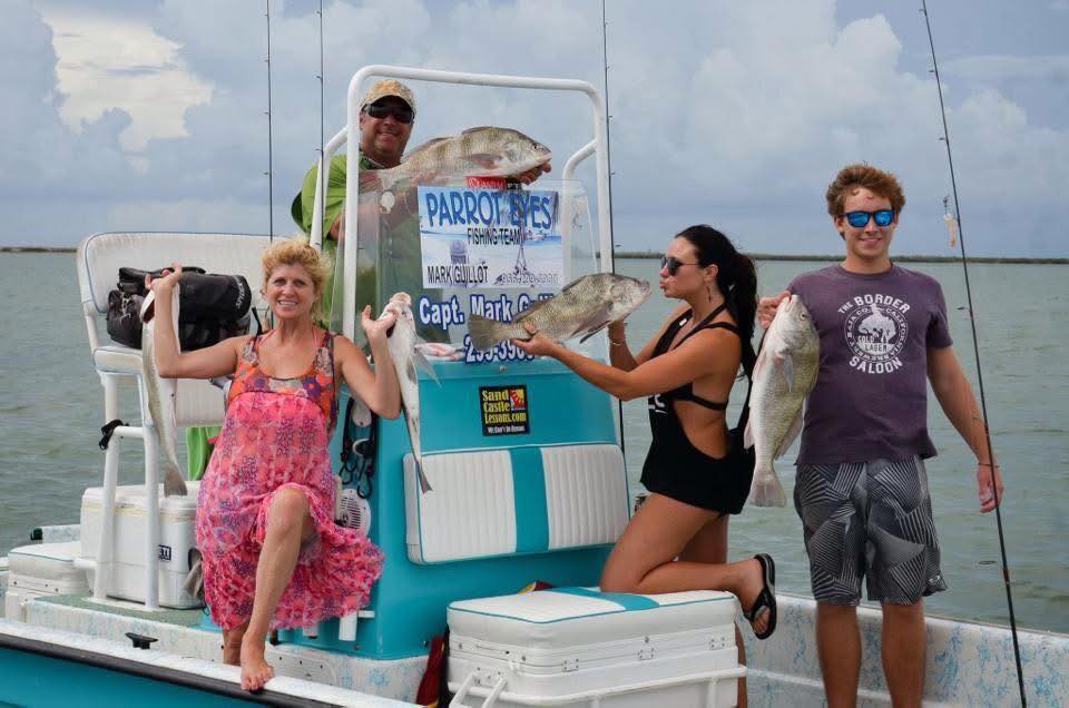 Fishing charter displaying fresh caught Black Drum and other species on boat in South Padre Island TX waters
