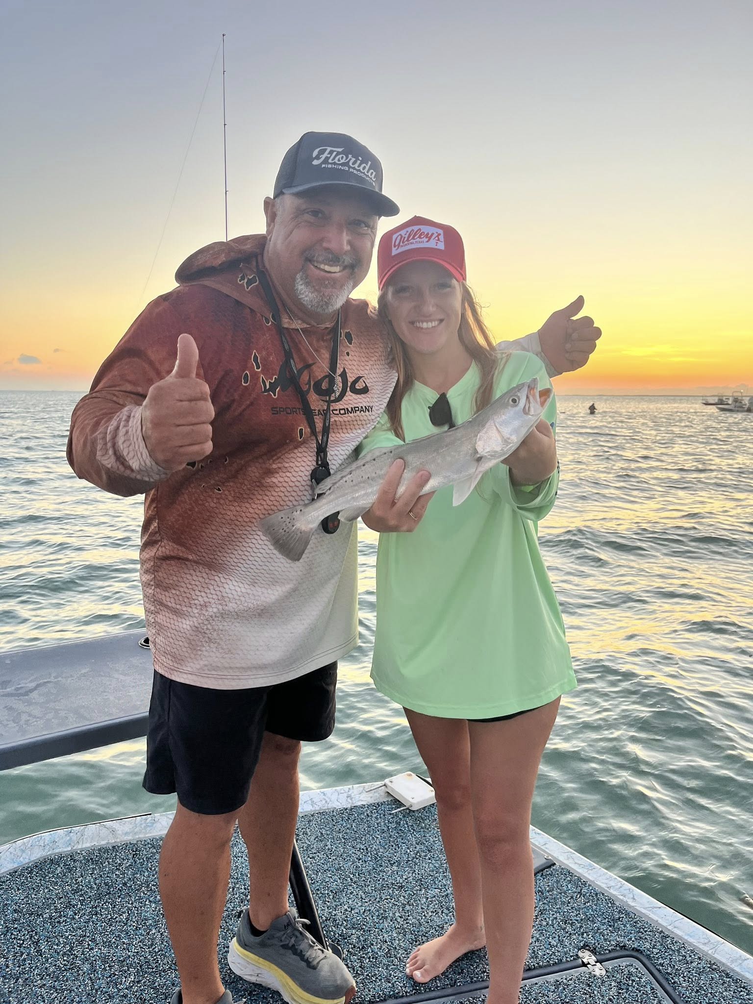 Speckled trout catch on fishing boat at South Padre Island TX during sunset