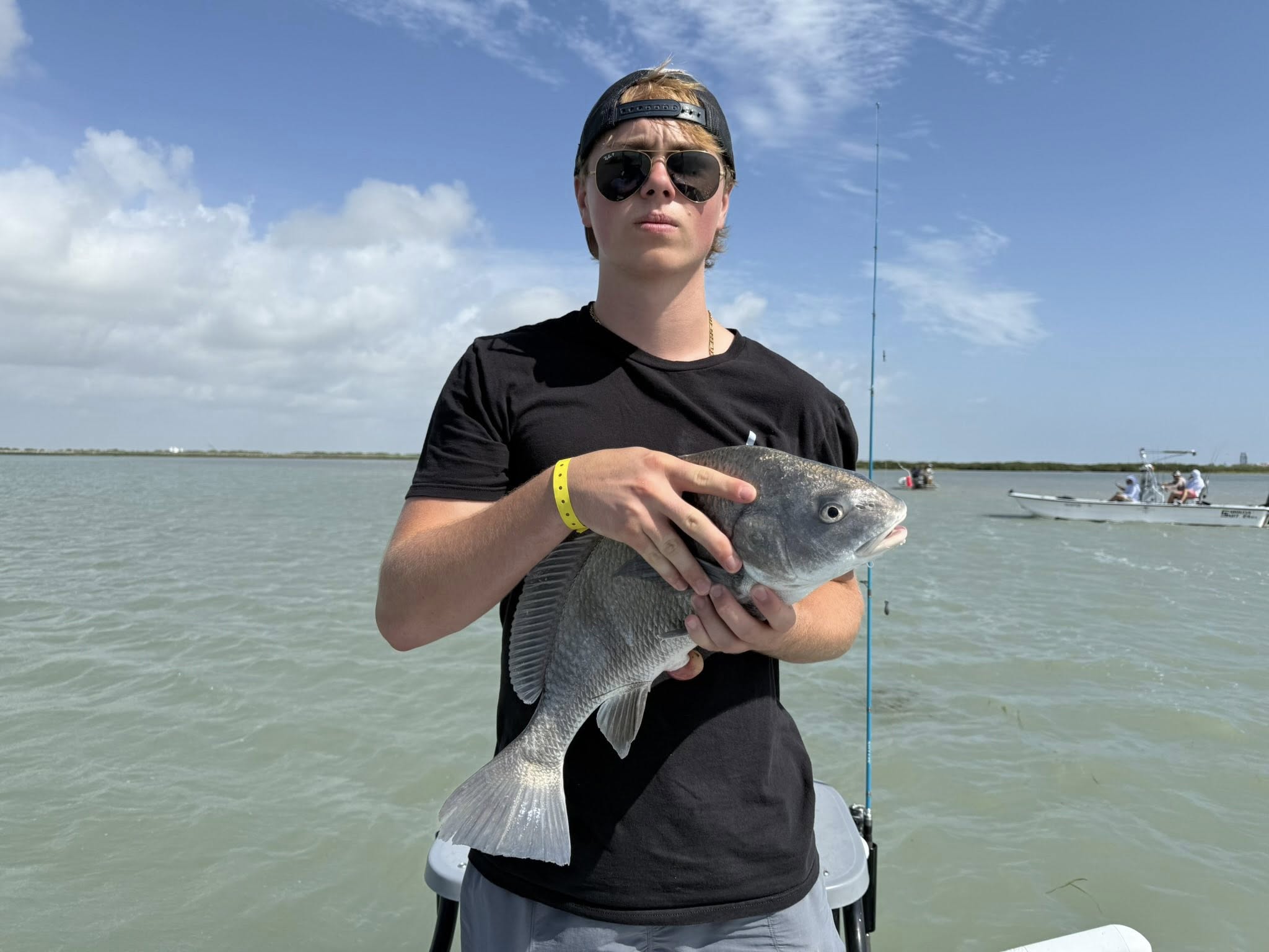 Captain Mark's 24' Dargel flats boat for beginner fishing trips in South Padre Island waters