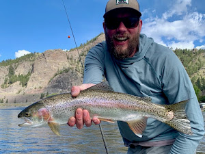 Rainbow trout fish caught while fishing in AB