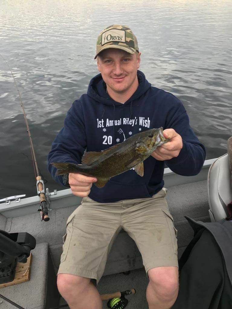 Angler with 14-inch fish in ME