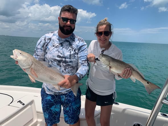 Two redfish caught during fishing trip in New Smyrna Beach FL
