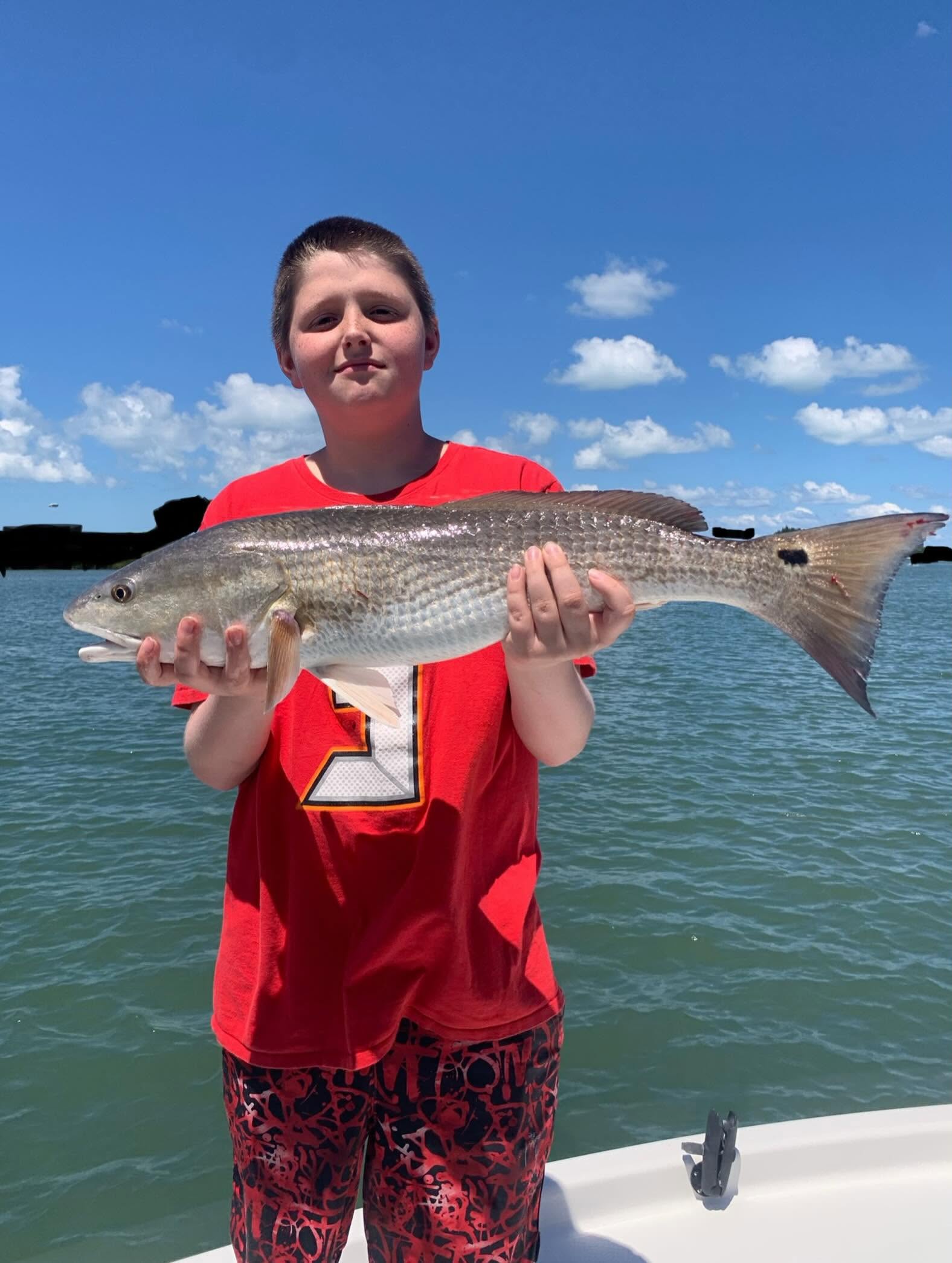 Redfish catch displayed on fishing charter boat in New Smyrna Beach FL