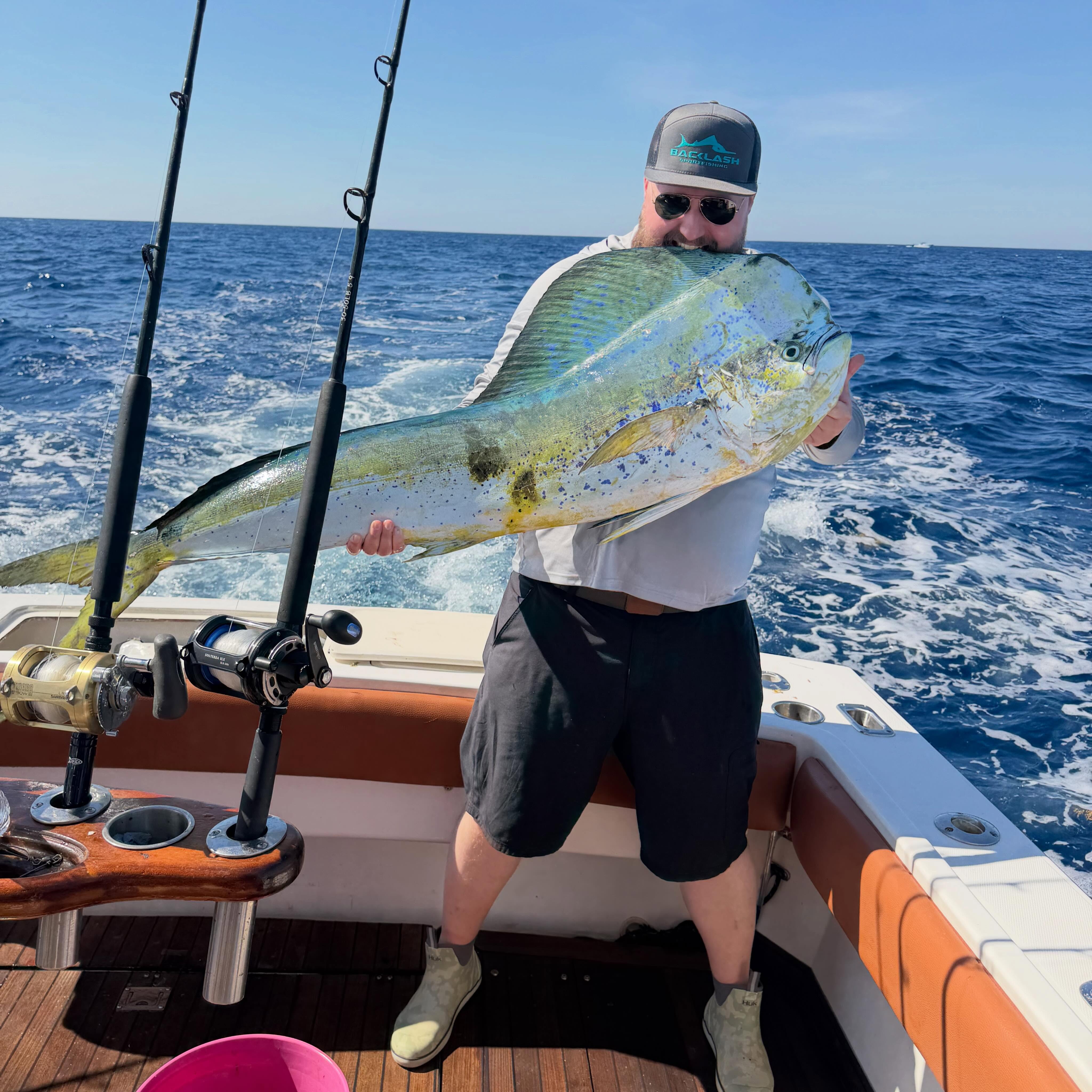 Mahi mahi catch displayed on fishing boat in Miami FL waters