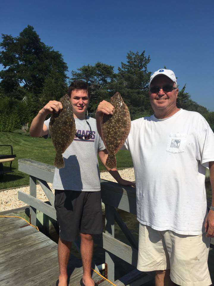 Two summer flounder fish caught in NY